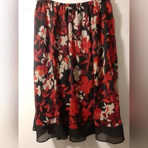 Sheer floral skirt with built in lining size 12 elastic waist